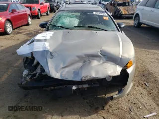 2005 Dodge Stratus SXT z VIN 4B3AG42G25E038535, wystawiony jako Copart lot #75240094 z przebiegiem Nie podano mil oraz Szkody całkowita. Historia ofert i sprzedaży dostępna na DreamBid. Obrazek 5.