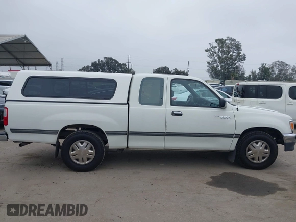 1995 Toyota T100 DX with VIN JT4VD12E1S0006336, listed as a IAAI auction lot 42153039 with 197,002 mi miles and . Bid and sale history available at DreamBid. Image 14.