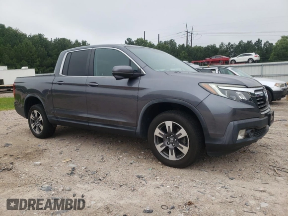 2017 Honda Ridgeline RTL-T with VIN 5FPYK3F65HB027242, listed as a Copart auction lot 62584355 with 43,165 mi miles and Salvage title. Bid and sale history available at DreamBid. Image 4.
