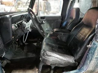 1994 Jeep Wrangler z VIN 1J4FY29S2RP471794, wystawiony jako Copart lot #47488005 z przebiegiem 165 900 mil mil oraz Nie do naprawy • Non repairable. Historia ofert i sprzedaży dostępna na DreamBid. Obrazek 7.