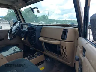 1999 Jeep Wrangler Sahara with VIN 1J4FY49S3XP407594, listed as a IAAI auction lot 42369363 with 253,780 mi miles and . Bid and sale history available at DreamBid. Image 5.