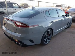 2020 Kia Stinger GT2 with VIN KNAE55LC1L6075699, listed as a IAAI auction lot 41598898 with 58,894 mi miles. Bid and sale history available at carsss.com. Image 4.
