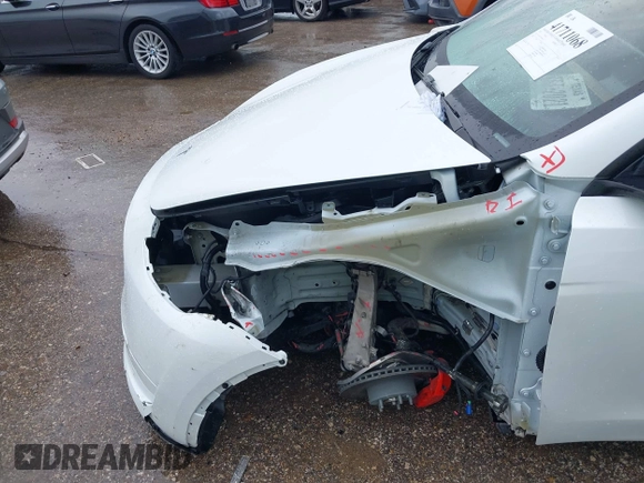 2023 Tesla Model Y Performance with VIN 7SAYGDEF7PF807312, listed as a IAAI auction lot 41711068 with 25,029 mi miles and . Bid and sale history available at DreamBid. Image 6.