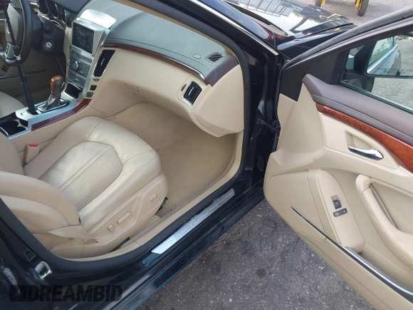 2008 Cadillac CTS RWD with VIN 1G6DF577680167610, listed as a IAAI auction lot 42595266 with 65,383 mi miles and . Bid and sale history available at DreamBid. Image 5.