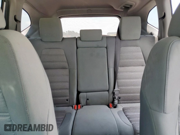 2019 Honda CR-V LX z VIN 2HKRW5H32KH406837, wystawiony jako Copart lot #57111585 z przebiegiem 123 047 mil mil oraz Szkoda całkowita • Salvage title. Historia ofert i sprzedaży dostępna na DreamBid. Obrazek 10.