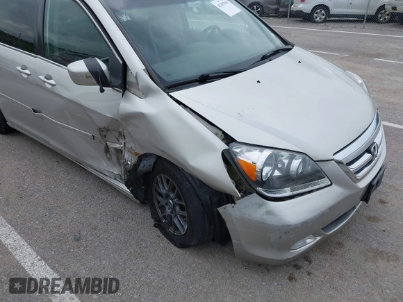 2007 Honda Odyssey Touring z VIN 5FNRL38877B091046, wystawiony jako IAAI lot #42187965 z przebiegiem Nie podano mil oraz . Historia ofert i sprzedaży dostępna na DreamBid. Obrazek 6.