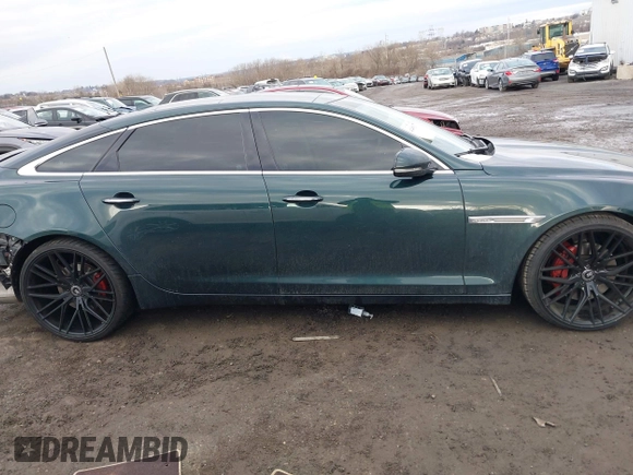 2015 Jaguar XJ Portfolio z VIN SAJWJ2GD7F8V84372, wystawiony jako IAAI lot #41489177 z przebiegiem 78 891 mil mil oraz . Historia ofert i sprzedaży dostępna na DreamBid. Obrazek 13.