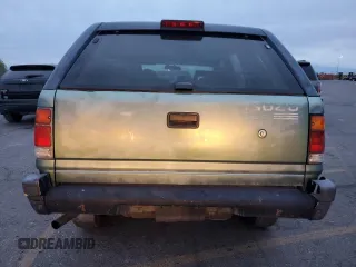 1996 Isuzu Rodeo z VIN 4S2CK58E1T4331031, wystawiony jako Copart lot #78573514 z przebiegiem 218 994 mil mil oraz Szkody całkowita. Historia ofert i sprzedaży dostępna na DreamBid. Obrazek 6.