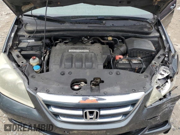 2006 Honda Odyssey EX-L z VIN 5FNRL38706B019434, wystawiony jako Copart lot #57397755 z przebiegiem 175 406 mil mil oraz Szkoda całkowita • Salvage title. Historia ofert i sprzedaży dostępna na DreamBid. Obrazek 12.