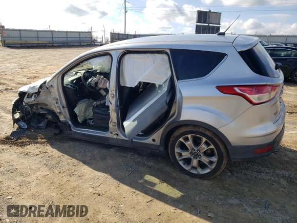 2013 Ford Escape SEL with VIN 1FMCU9HX7DUA60178, listed as a Copart auction lot 85203234 with 144,153 mi miles and Salvage Title. Bid and sale history available at carsss.com. Image 2.