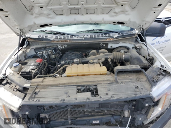 2020 Ford F-150 XL with VIN 1FTMF1CB3LKD51612, listed as a Copart auction lot 52724055 with 147,261 mi miles and Salvage title. Bid and sale history available at DreamBid. Image 11.