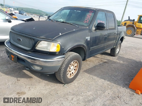2001 Ford F-150 XLT with VIN 1FTRW08L61KD90032, listed as a IAAI auction lot 42385610 with 164,252 mi miles and . Bid and sale history available at DreamBid. Image 2.