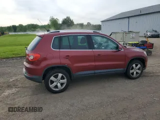 2010 Volkswagen Tiguan S z VIN WVGAV7AX4AW003844, wystawiony jako Copart lot #57877965 z przebiegiem 120 783 mil mil oraz Tytuł czysty. Historia ofert i sprzedaży dostępna na DreamBid. Obrazek 3.