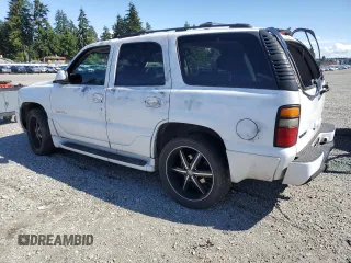 2005 GMC Yukon Denali z VIN 1GKEK63U55J143324, wystawiony jako Copart lot #59000695 z przebiegiem Nie podano mil oraz Szkoda całkowita • Salvage title. Historia ofert i sprzedaży dostępna na DreamBid. Obrazek 2.