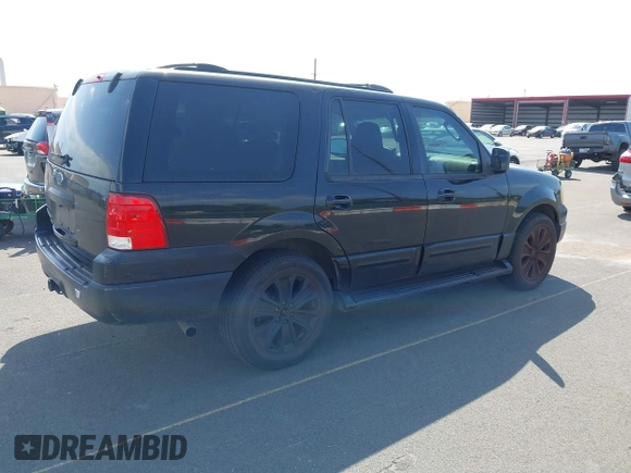 2003 Ford Expedition XLT Value with VIN 1FMPU16W73LC19198, listed as a IAAI auction lot 41570000 with 111,893 mi miles. Bid and sale history available at carsss.com. Image 4.