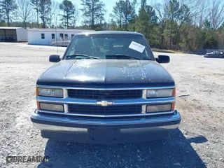 1999 Chevrolet Suburban with VIN 3GNEC16R0XG137834, listed as a IAAI auction lot 41853492 with 296,147 mi miles. Bid and sale history available at carsss.com. Image 12.