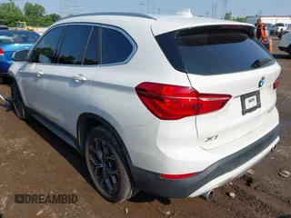 2021 BMW X1 xDrive28i with VIN WBXJG9C02M3M42379, listed as a IAAI auction lot 42476221 with 60,412 mi miles and . Bid and sale history available at DreamBid. Image 3.