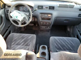 2000 Honda CR-V LX with VIN JHLRD1848YC038520, listed as a Copart auction lot 74137634 with 104,332 mi miles and Salvage Title. Bid and sale history available at carsss.com. Image 8.