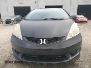 2009 Honda Fit Sport with VIN JHMGE88479S060797, listed as a Copart auction lot 54009135 with 167,914 mi miles and Salvage Title. Bid and sale history available at carsss.com. Image 5.