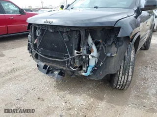 2015 Jeep Grand Cherokee Altitude with VIN 1C4RJFAG2FC956607, listed as a IAAI auction lot 41818479 with 98,879 mi miles. Bid and sale history available at carsss.com. Image 6.