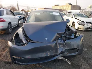 2024 Tesla Model Y Long Range with VIN 7SAYGDEE2RA217008, listed as a IAAI auction lot 41245093 with 17,773 mi miles. Bid and sale history available at carsss.com. Image 12.