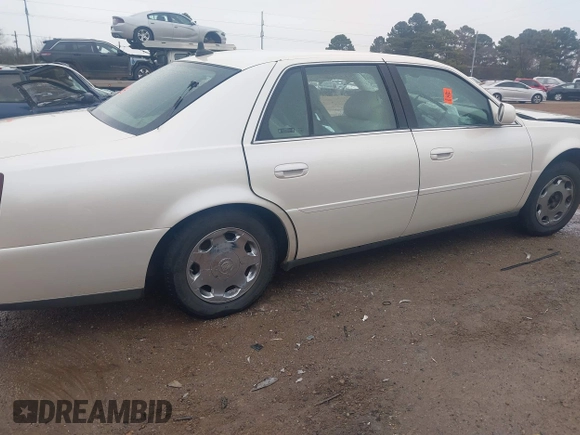 2002 Cadillac DeVille DHS z VIN 1G6KE57YX2U212020, wystawiony jako IAAI lot #41287342 z przebiegiem Nie podano mil oraz . Historia ofert i sprzedaży dostępna na DreamBid. Obrazek 13.