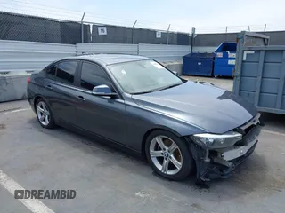 2014 BMW 3 Series 320i xDrive with VIN WBA3C3C58EP661414, listed as a IAAI auction lot 42489010 with 93,488 mi miles and . Bid and sale history available at DreamBid. Image 1.