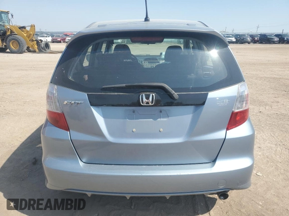 2011 Honda Fit Sport z VIN JHMGE8H53BC021245, wystawiony jako Copart lot #55393345 z przebiegiem 133 910 mil mil oraz Szkody całkowita. Historia ofert i sprzedaży dostępna na DreamBid. Obrazek 6.