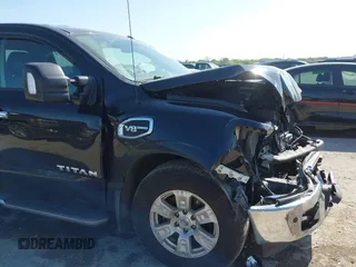 2017 Nissan Titan SV with VIN 1N6AA1E68HN535917, listed as a IAAI auction lot 41974261 with 162,561 mi miles and . Bid and sale history available at DreamBid. Image 6.