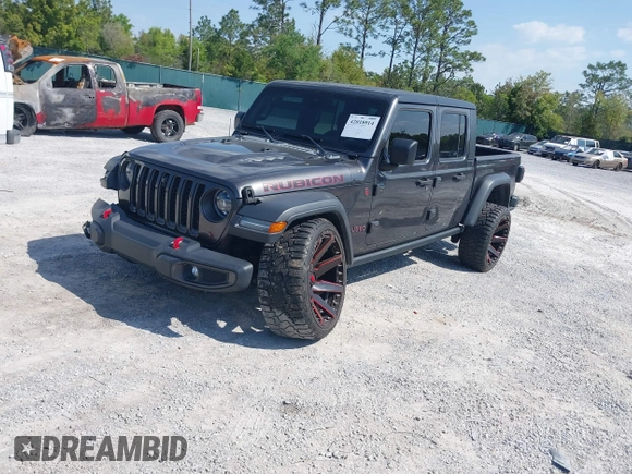 2020 Jeep Gladiator Rubicon with VIN 1C6JJTBG0LL187537, listed as a IAAI auction lot 42018914 with 53,443 mi miles and . Bid and sale history available at DreamBid. Image 18.