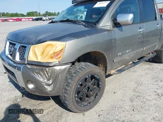 2006 Nissan Titan LE z VIN 1N6BA07B86N566431, wystawiony jako IAAI lot #42000954 z przebiegiem 230 325 mil mil oraz . Historia ofert i sprzedaży dostępna na DreamBid. Obrazek 6.