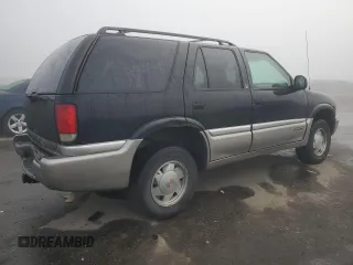 1998 GMC Jimmy SL with VIN 1GKCS13W8W2572514, listed as a Copart auction lot 83016224 with 85,044 mi miles and Salvage Title. Bid and sale history available at carsss.com. Image 3.