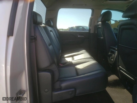 2013 GMC Sierra 1500 SLT with VIN 3GTP2WE70DG252706, listed as a Copart auction lot 52069795 with 145,677 mi miles and Salvage Title. Bid and sale history available at carsss.com. Image 10.