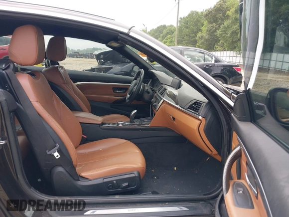 2014 BMW 4 Series 435i with VIN WBA3T3C50EJ876997, listed as a IAAI auction lot 42406299 with 115,048 mi miles and . Bid and sale history available at DreamBid. Image 5.