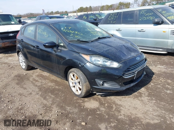 2019 Ford Fiesta SE with VIN 3FADP4EJ0KM136804, listed as a IAAI auction lot 41657106 with 999,999 mi miles. Bid and sale history available at carsss.com. Image 1.