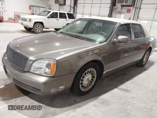 2000 Cadillac DeVille z VIN 1G6KD54Y6YU265538, wystawiony jako IAAI lot #41748755 z przebiegiem 159 676 mil mil oraz . Historia ofert i sprzedaży dostępna na DreamBid. Obrazek 2.