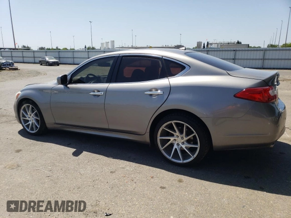 2013 Infiniti M with VIN JN1BY1AP2DM511973, listed as a Copart auction lot 55351815 with 126,888 mi miles and Salvage title. Bid and sale history available at DreamBid. Image 2.