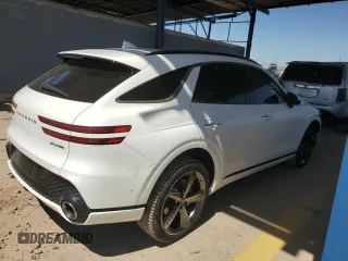 2022 Genesis GV70 Sport z VIN KMUMCDTC7NU038800, wystawiony jako Copart lot #71394474 z przebiegiem 40 933 mil mil oraz Szkoda całkowita • Salvage title. Historia ofert i sprzedaży dostępna na DreamBid. Obrazek 3.