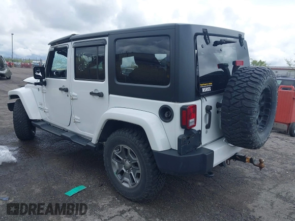 2016 Jeep Wrangler Unlimited Sahara with VIN 1C4BJWEG8GL129577, listed as a IAAI auction lot 42184373 with 185,761 mi miles and . Bid and sale history available at DreamBid. Image 3.