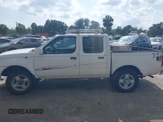 2001 Nissan Frontier SE z VIN 1N6ED27T61C324671, wystawiony jako IAAI lot #42403537 z przebiegiem 190 638 mil mil oraz . Historia ofert i sprzedaży dostępna na DreamBid. Obrazek 14.