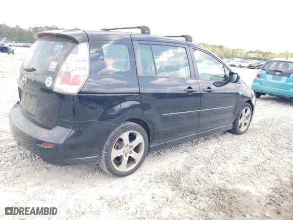 2006 Mazda Mazda5 Sport with VIN JM1CR293360125644, listed as a Copart auction lot 51659235 with 128,532 mi miles and Salvage Title. Bid and sale history available at carsss.com. Image 3.