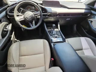 2022 Mazda 3 2.5 Turbo z VIN 3MZBPBAY9NM305244, wystawiony jako Copart lot #63661025 z przebiegiem 89 066 mil mil oraz Czysty tytuł • Clean title. Historia ofert i sprzedaży dostępna na DreamBid. Obrazek 8.