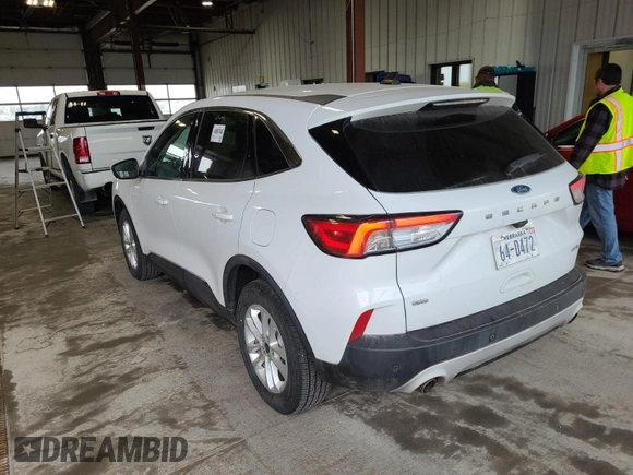 2020 Ford Escape SE with VIN 1FMCU9G60LUB25735, listed as a IAAI auction lot 42663606 with 91,591 mi miles and . Bid and sale history available at DreamBid. Image 22.