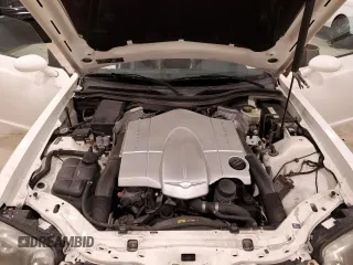 2004 Chrysler Crossfire с VIN 1C3AN69L64X009535, выставлен на аукционе Copart как лот 51344405 с пробегом Не указан миль и На запчасти • Non repairable. История ставок и продаж доступна на DreamBid. Изображение 11.