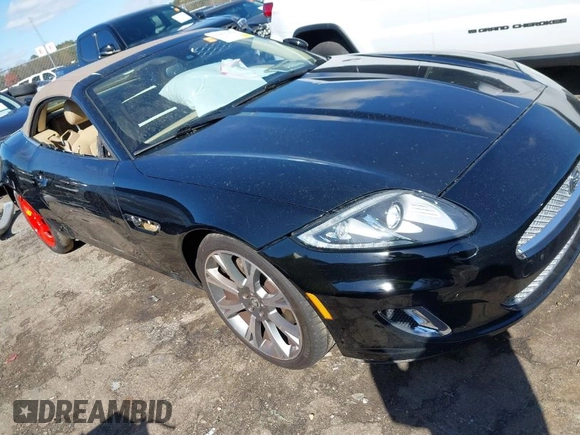 2014 Jaguar XK with VIN SAJWA4GB0ELB52358, listed as a IAAI auction lot 41832850 with 93,037 mi miles. Bid and sale history available at carsss.com. Image 1.