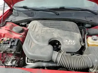 2018 Dodge Charger SXT with VIN 2C3CDXBGXJH119406, listed as a Copart auction lot 89819295 with 124,136 mi miles and Salvage title. Bid and sale history available at DreamBid. Image 14.