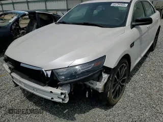 2018 Ford Taurus SHO z VIN 1FAHP2KT6JG107120, wystawiony jako Copart lot #54734405 z przebiegiem 55 800 mil mil oraz Czysty tytuł • Clean title. Historia ofert i sprzedaży dostępna na DreamBid. Obrazek 14.