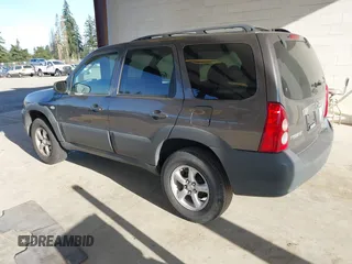2006 Mazda Tribute i with VIN 4F2YZ02Z26KM12180, listed as a IAAI auction lot 41959606 with 228,217 mi miles and . Bid and sale history available at DreamBid. Image 3.