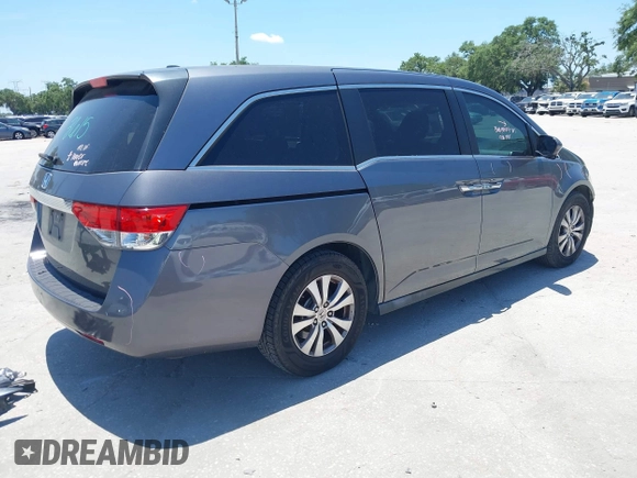 2014 Honda Odyssey EX-L z VIN 5FNRL5H69EB095297, wystawiony jako IAAI lot #42299438 z przebiegiem 126 841 mil mil oraz . Historia ofert i sprzedaży dostępna na DreamBid. Obrazek 4.