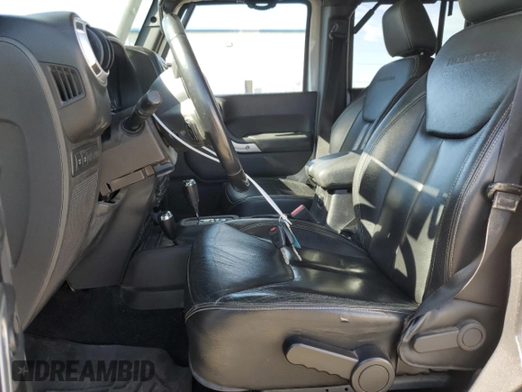 2013 Jeep Wrangler Unlimited Rubicon с VIN 1C4HJWFG3DL575477, выставлен на аукционе Copart как лот 63424765 с пробегом 133 085 миль миль и Чистый • Clean title. История ставок и продаж доступна на DreamBid. Изображение 7.